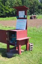 red pick your own shed with tractor